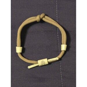 RASTACLAT KNOTTED SHOELACE BRAIDED PULL TO CLOSE BRACELET.